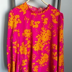 Used pink and orange floral blouse.